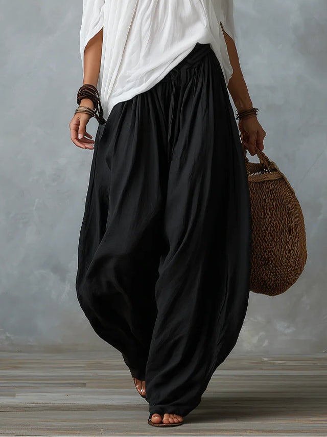 Weißes Off-Shoulder-Top und lockere Laternenhose Set