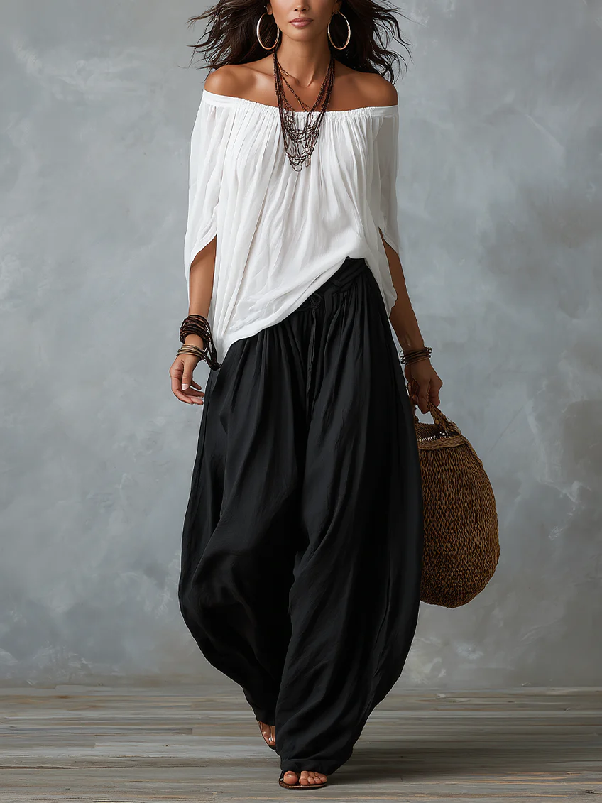 Weißes Off-Shoulder-Top und lockere Laternenhose Set